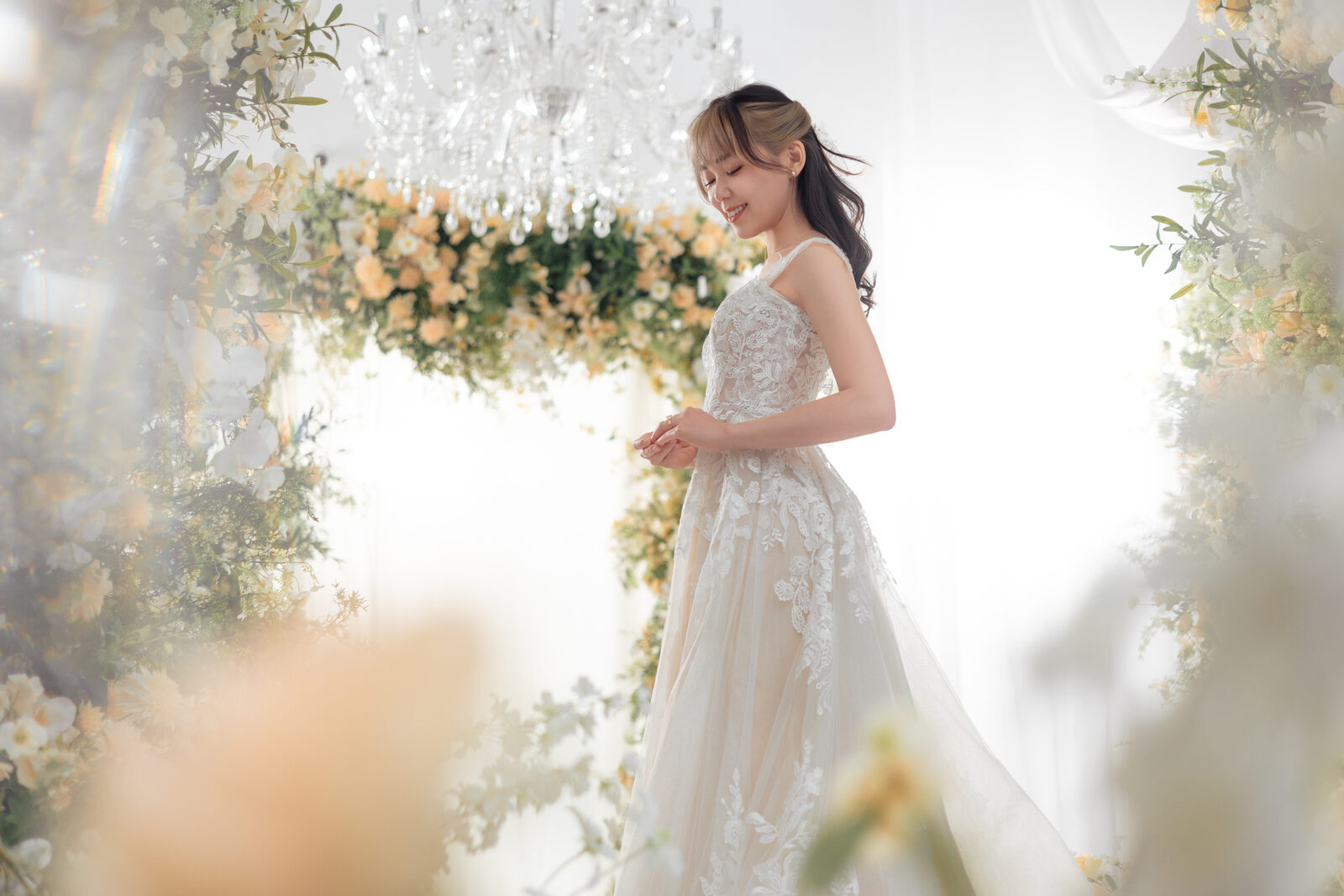 24 Flowers Garden — bride portrait with soft floral backdrop and chandelier