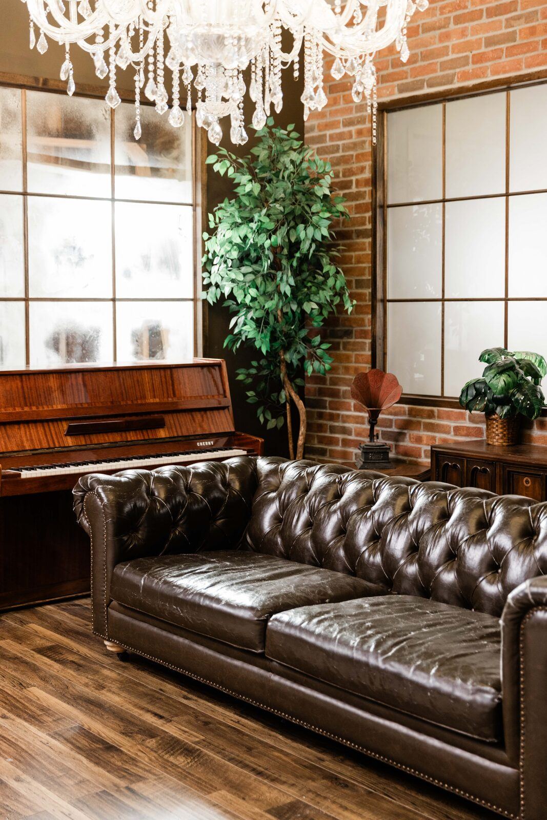 Mozart Studio — piano and chandelier